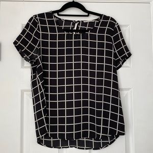 Black and white checkered blouse
